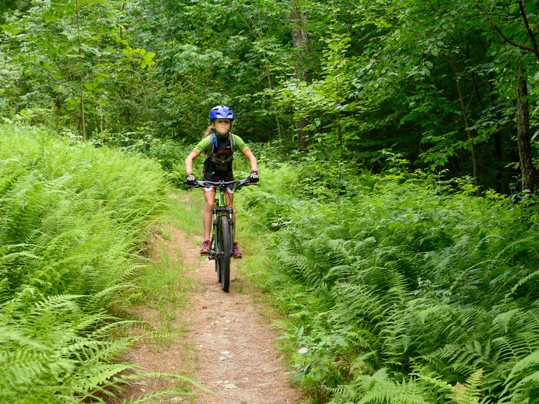 Young mountain biker on the Slate Valley Trail system