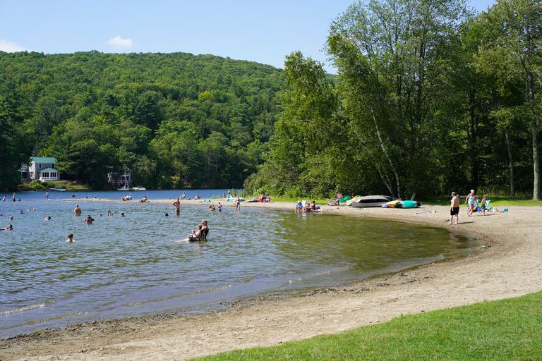 Swimmers enjoying the beach at Lake St. Catherine